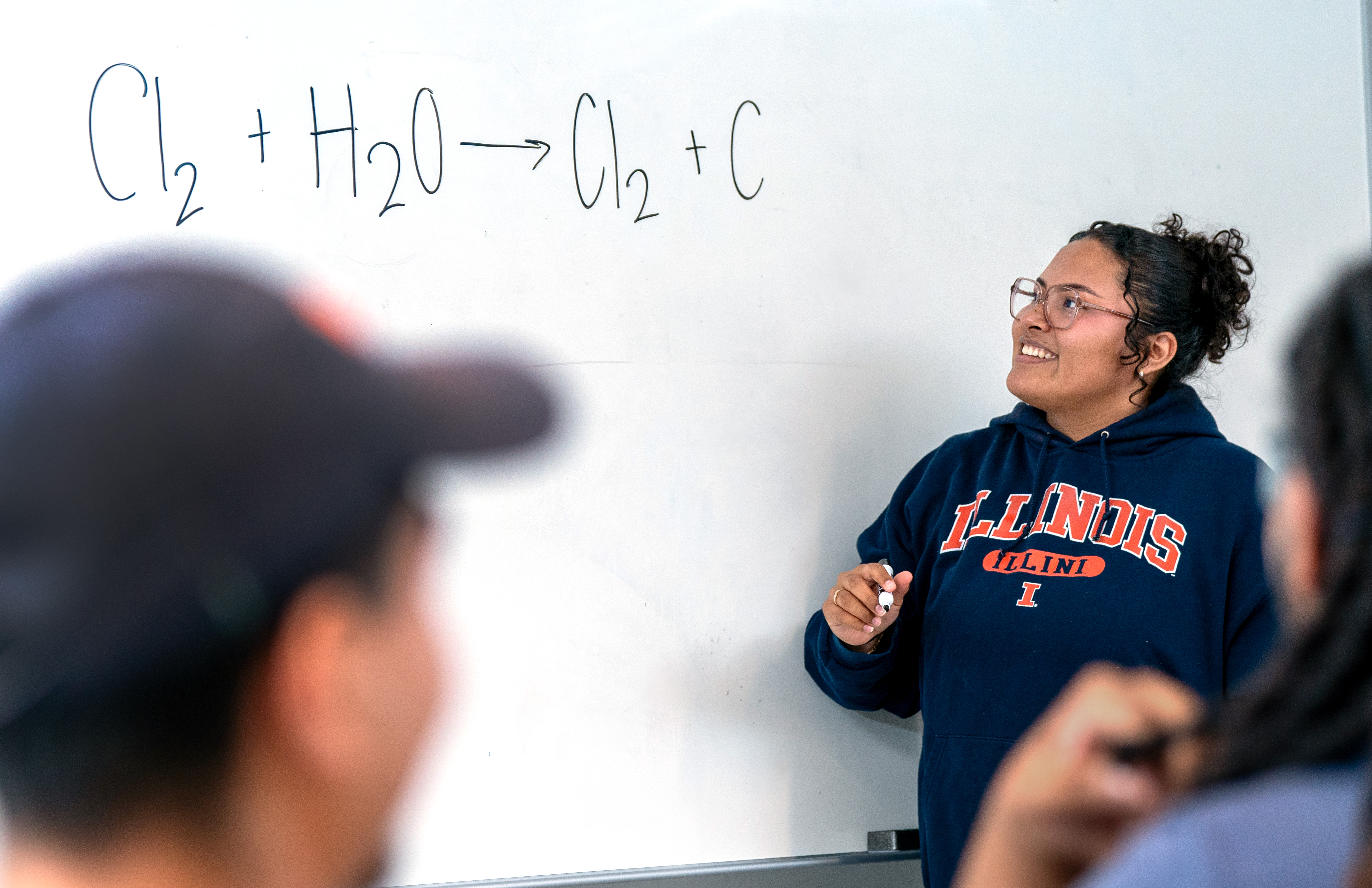 Aleidy Jimenez (Class of 2027) teaching CHEM 102 to her peers.