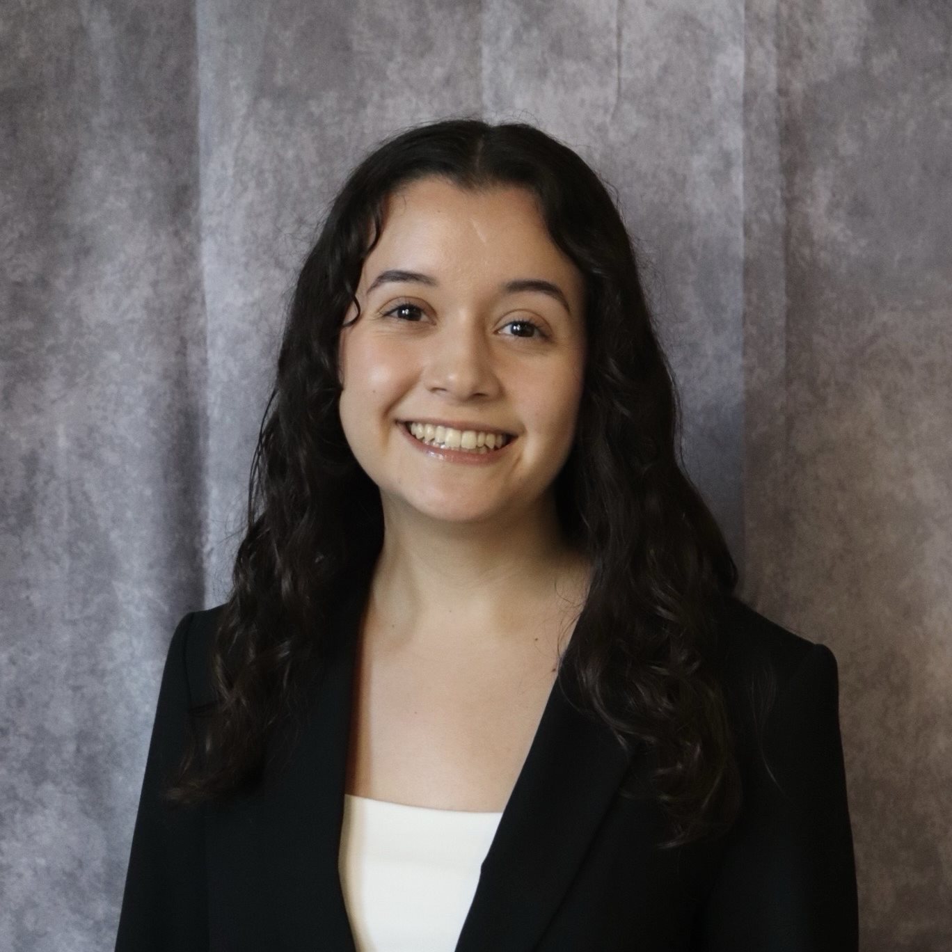 Sparks fly as student uses saw on metal