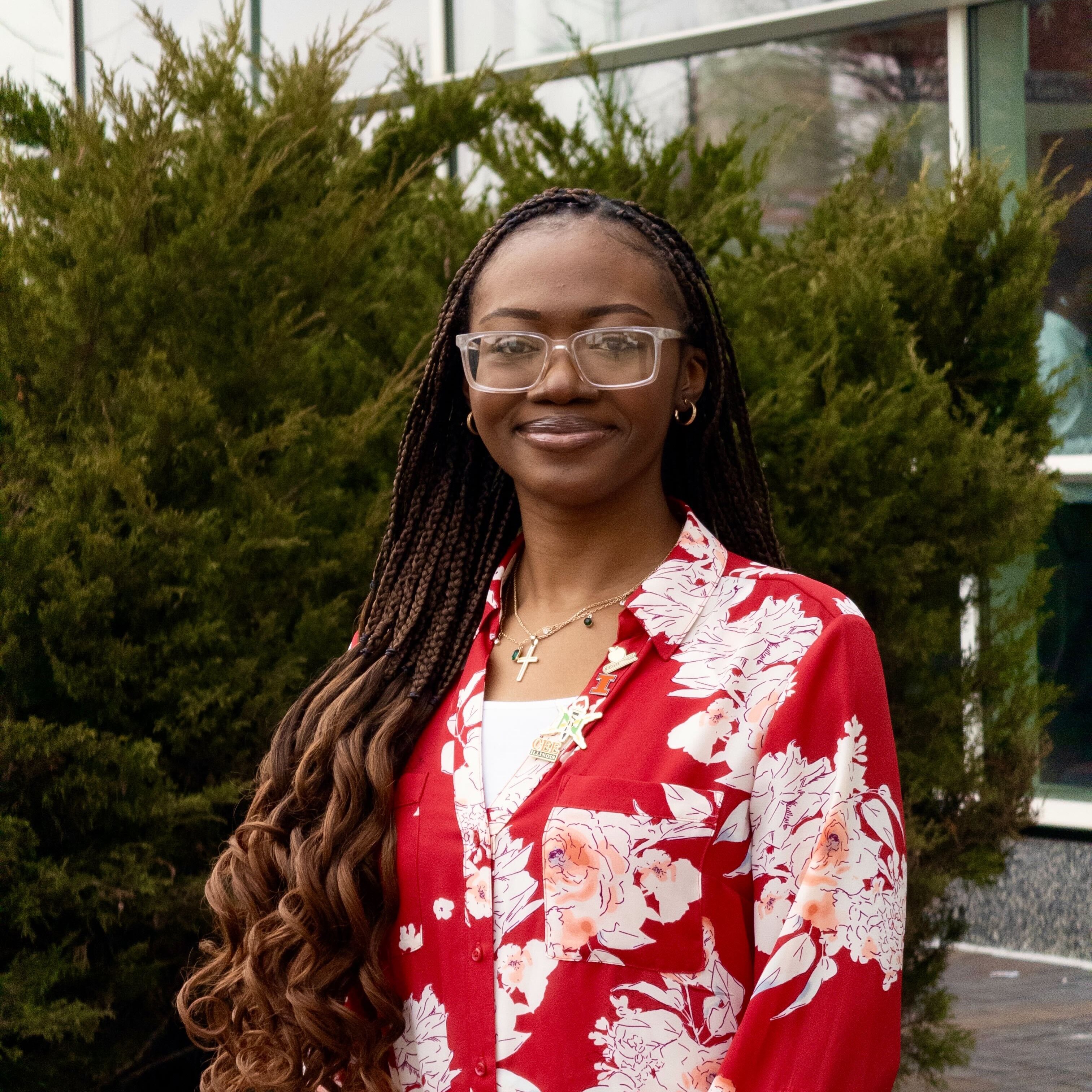 Student working with syringe and test tube in lab